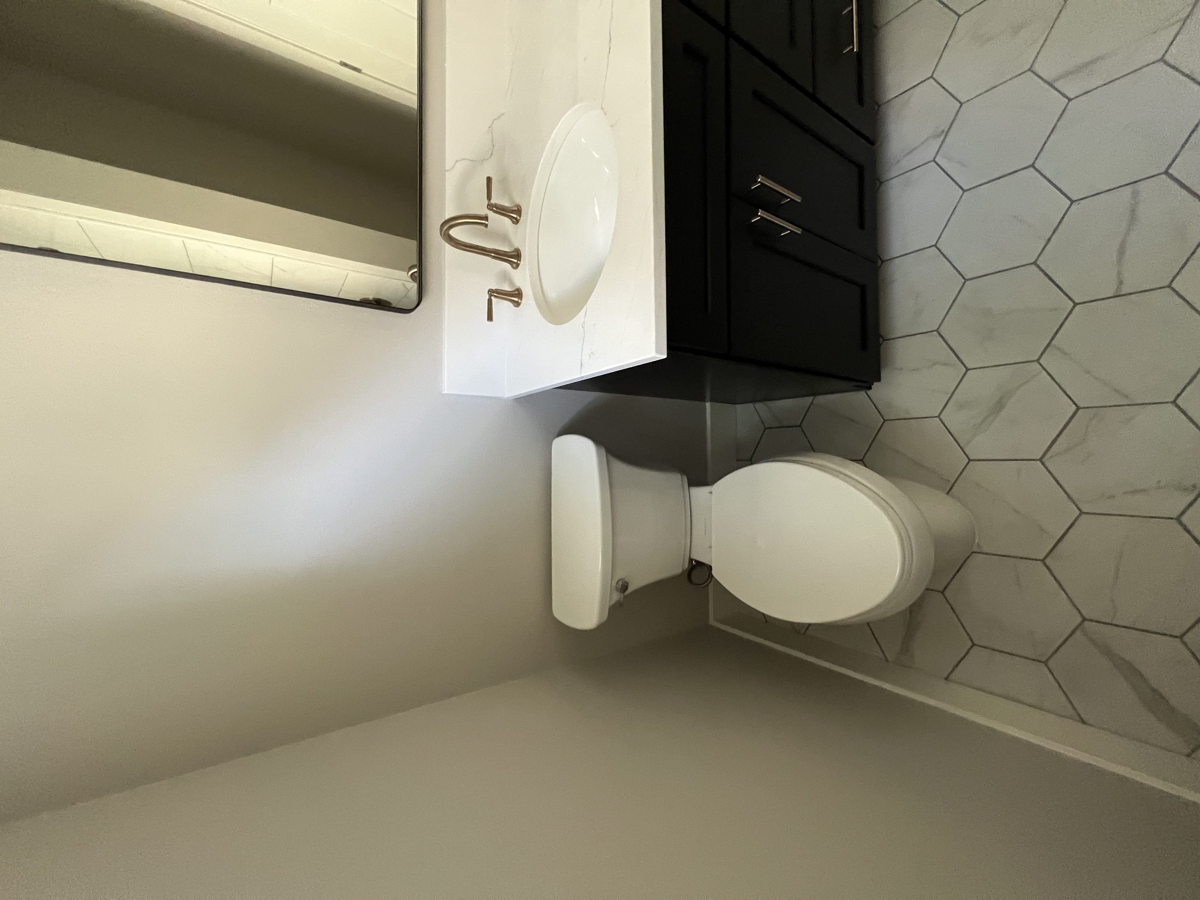 Double bathroom remodel tile pattern